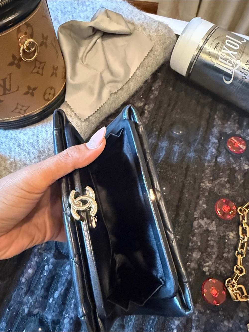 CHANEL Black Quilted Leather Triple-Compartment Wallet with Gold CC